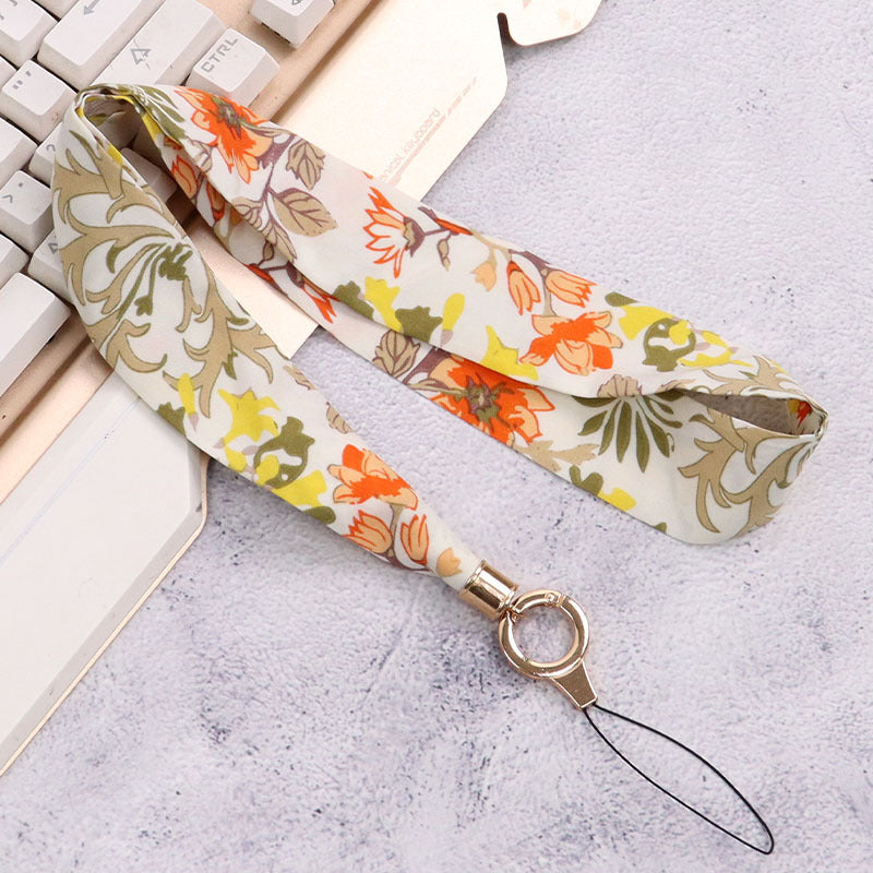 Cordón de tela para celular o multiusos crisantemo beige
